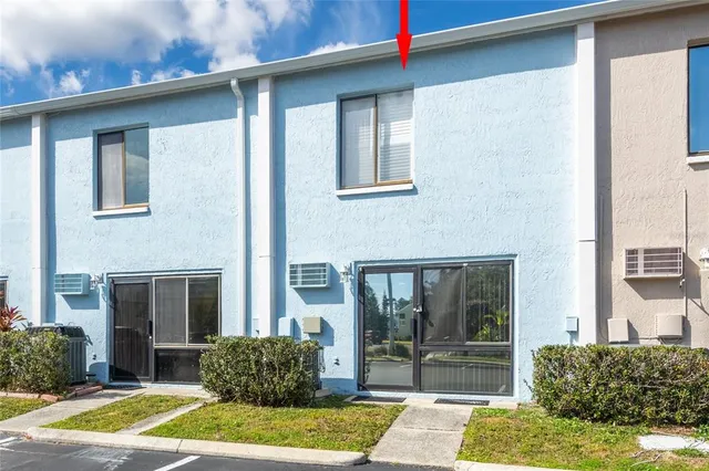 a view of a house with a patio