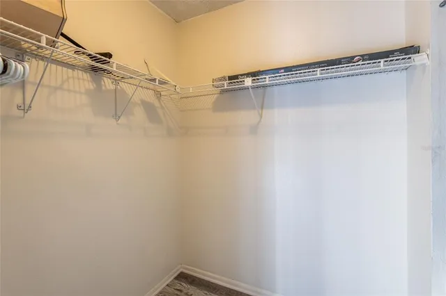 a view of a room with racks on the wall