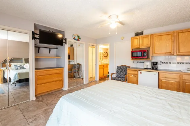 a bedroom with a bed and furniture