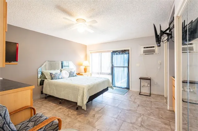 a bedroom with a bed and a cabinets