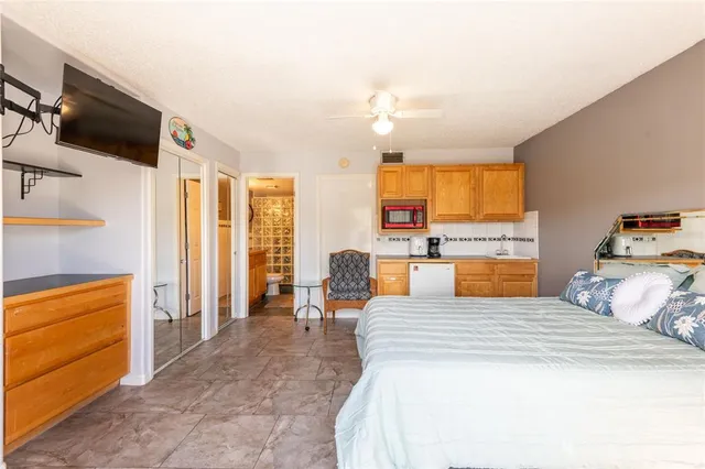 a bedroom with a bed and furniture