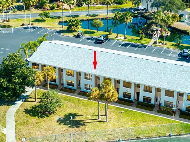 a view of a swimming pool with a patio