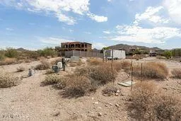 a view of a pathway with a yard