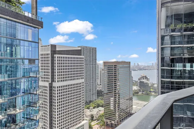 a view of balcony with a floor to ceiling window and wooden floor