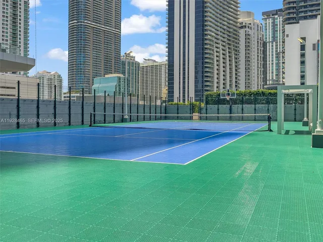 a swimming pool with outdoor seating and yard