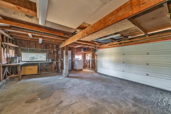 a view of backyard with a wooden deck and wooden floor