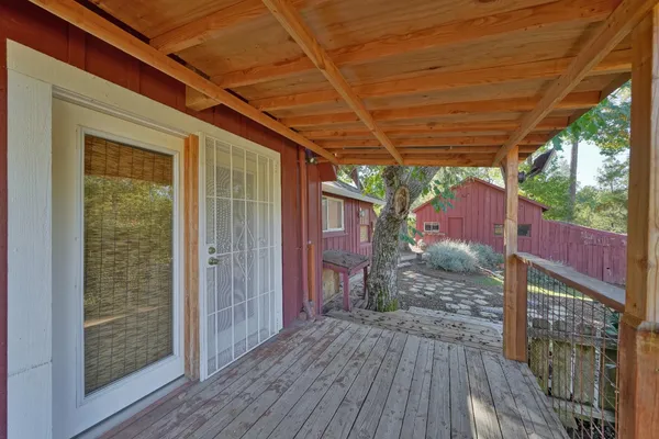 a view of a yard with an outdoor space