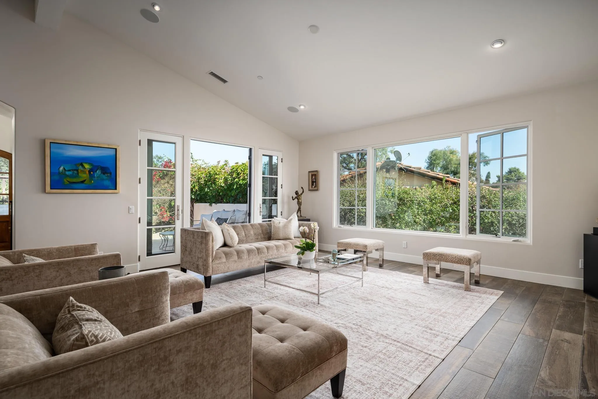 6152 Camino Selva Rancho Santa Fe, CA 92067 - Photo 13 of 37 a living room with furniture and large windows