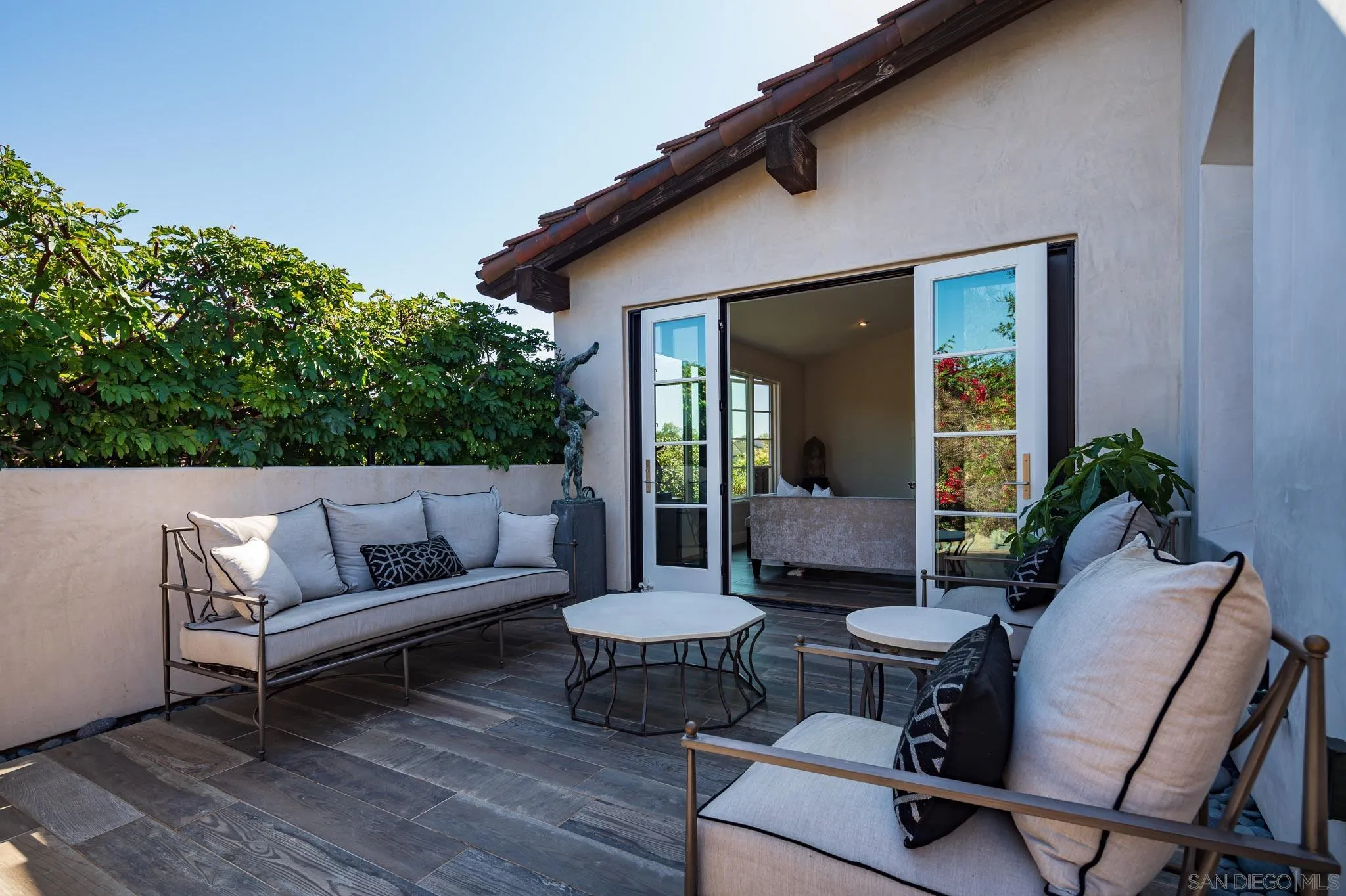 6152 Camino Selva Rancho Santa Fe, CA 92067 - Photo 7 of 37 a living room with furniture and a potted plant