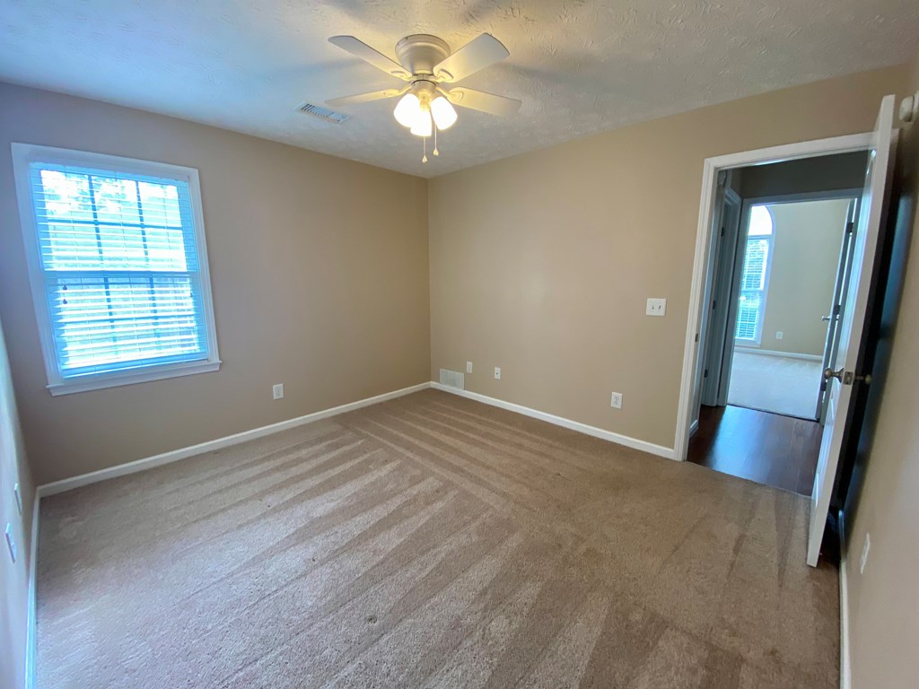 1815 Saffron Court Columbus, GA 31909 - Photo 16 of 20 a view of an empty room with a window