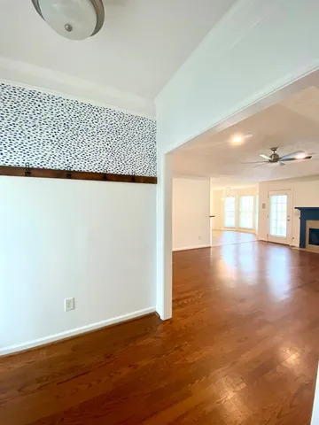 a view of a livingroom with wooden floor