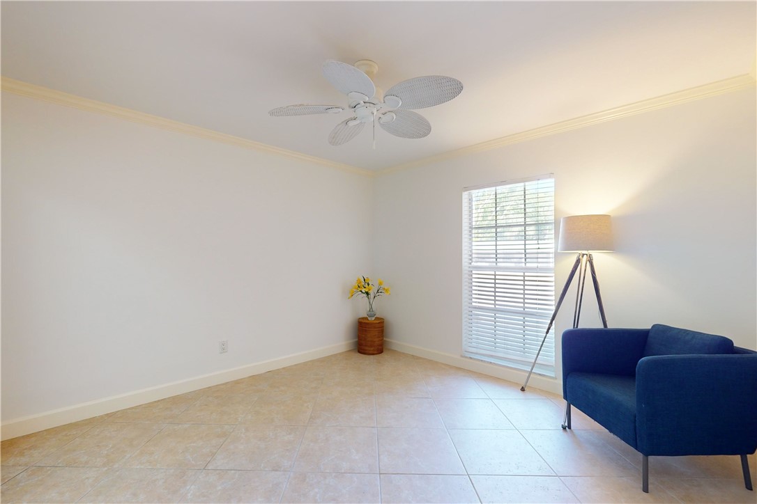 550 Riomar Drive, Unit 24 Vero Beach, FL 32963 - Photo 19 of 35 a living room with furniture and a window