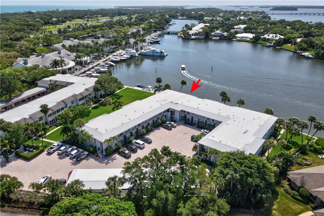 550 Riomar Drive, Unit 24 Vero Beach, FL 32963 - Photo 2 of 35 an aerial view of a house with a lake view