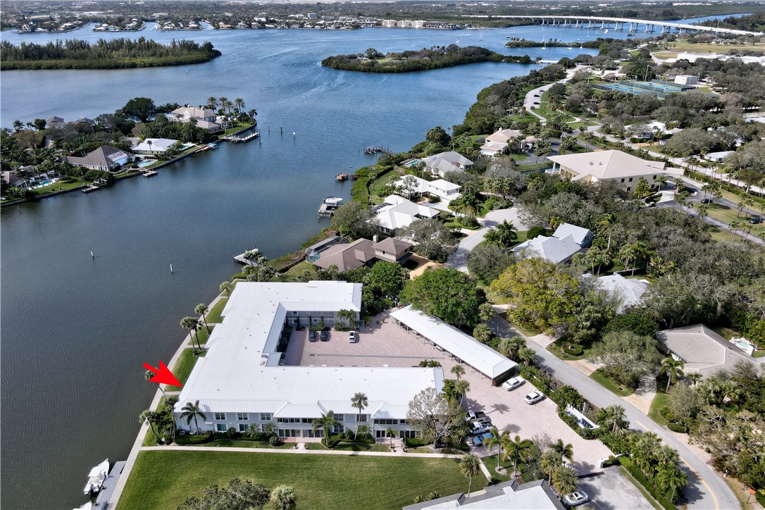 550 Riomar Drive, Unit 24 Vero Beach, FL 32963 - Photo 32 of 35 an aerial view of a house with swimming pool and outdoor seating