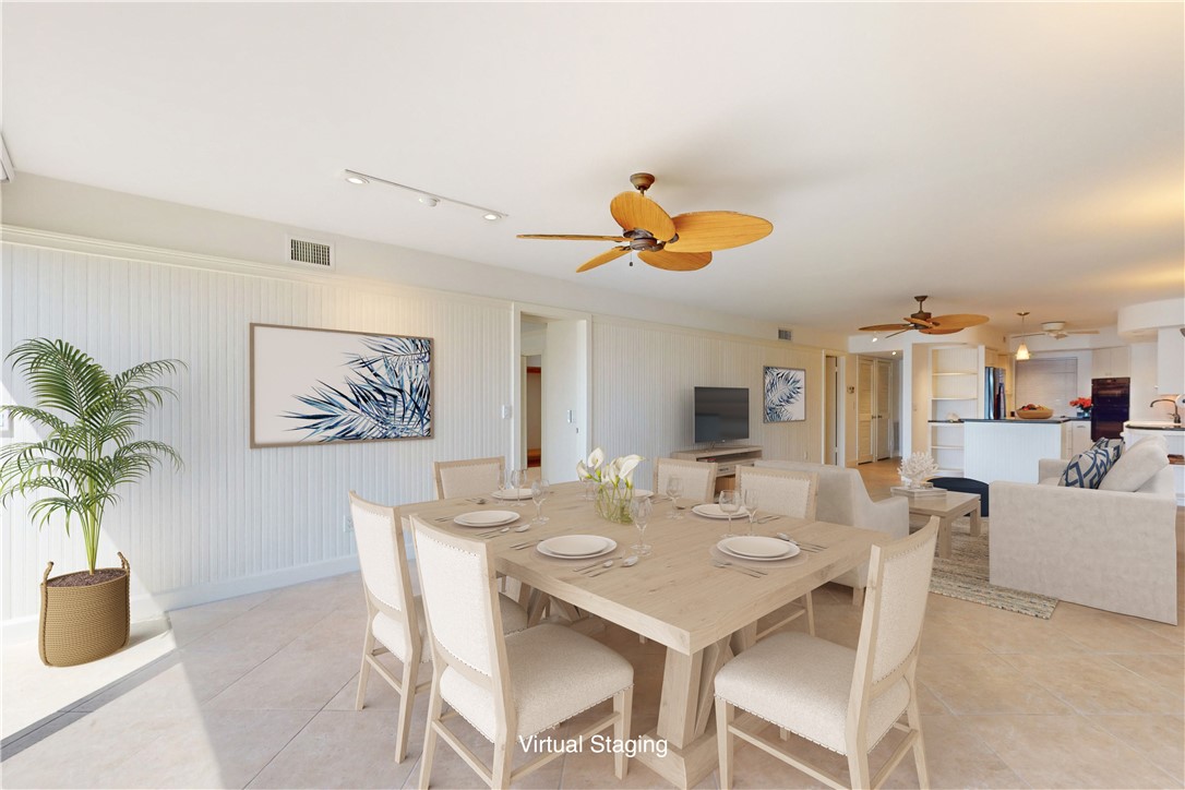 550 Riomar Drive, Unit 24 Vero Beach, FL 32963 - Photo 5 of 35 a view of a dining room with furniture and chandelier