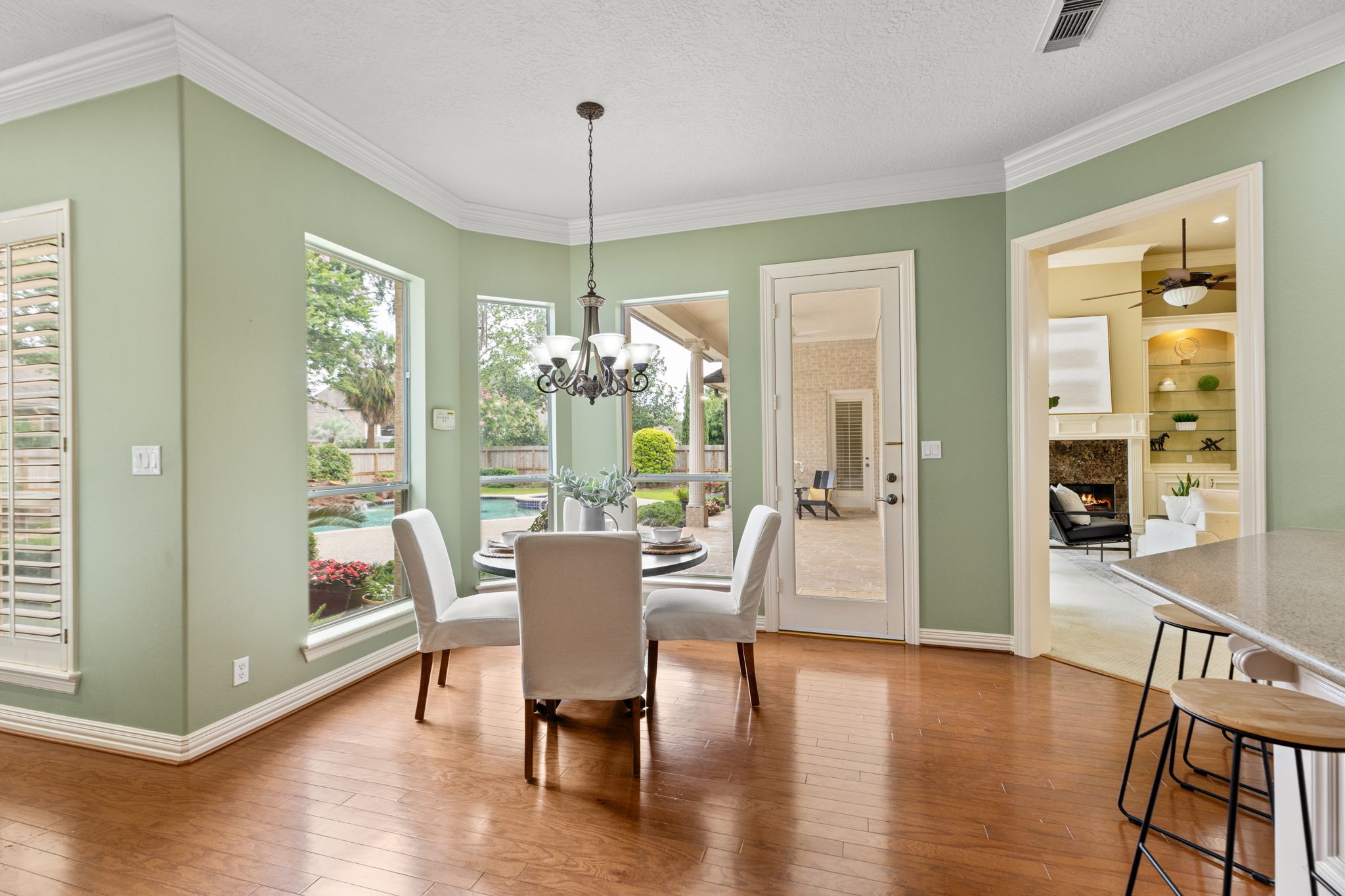 6610 Radley Drive Spring, TX 77379 - Photo 16 of 50 Breakfast area w/ full view of all your outdoor living options. Solid wood floors are in perfect condition thru-out living home.