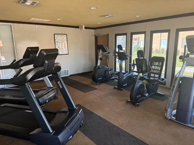a view of swimming pool with a outdoor seating