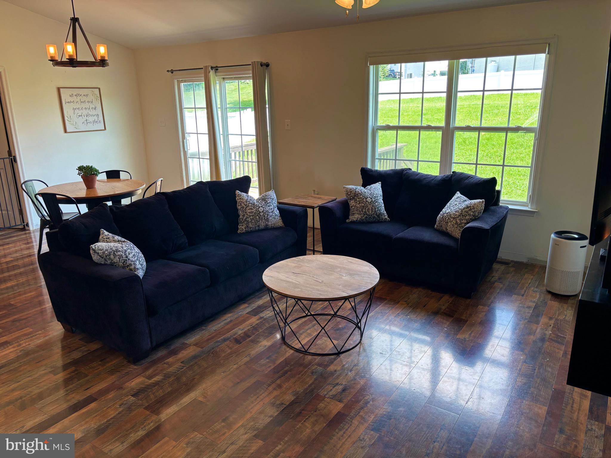 56 Reprisal Road Inwood, WV 25428 - Photo 2 of 31 a living room with furniture and a window