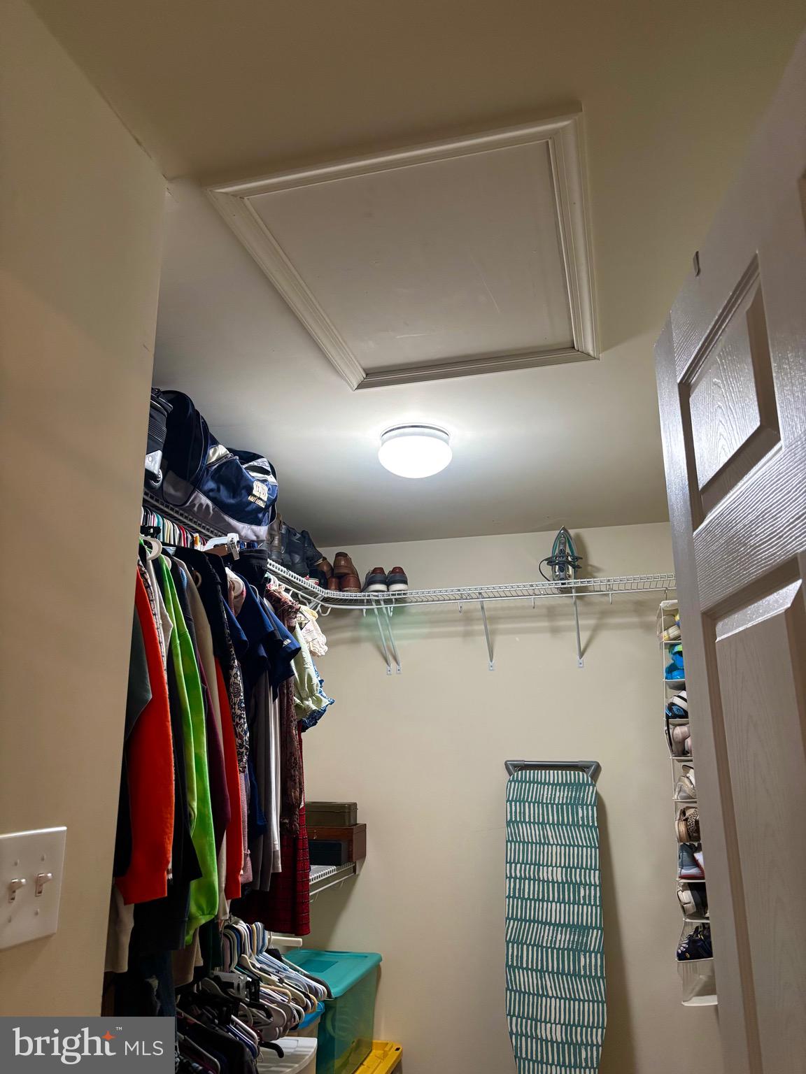 56 Reprisal Road Inwood, WV 25428 - Photo 21 of 31 a view of walk in closet with clothes and shoes
