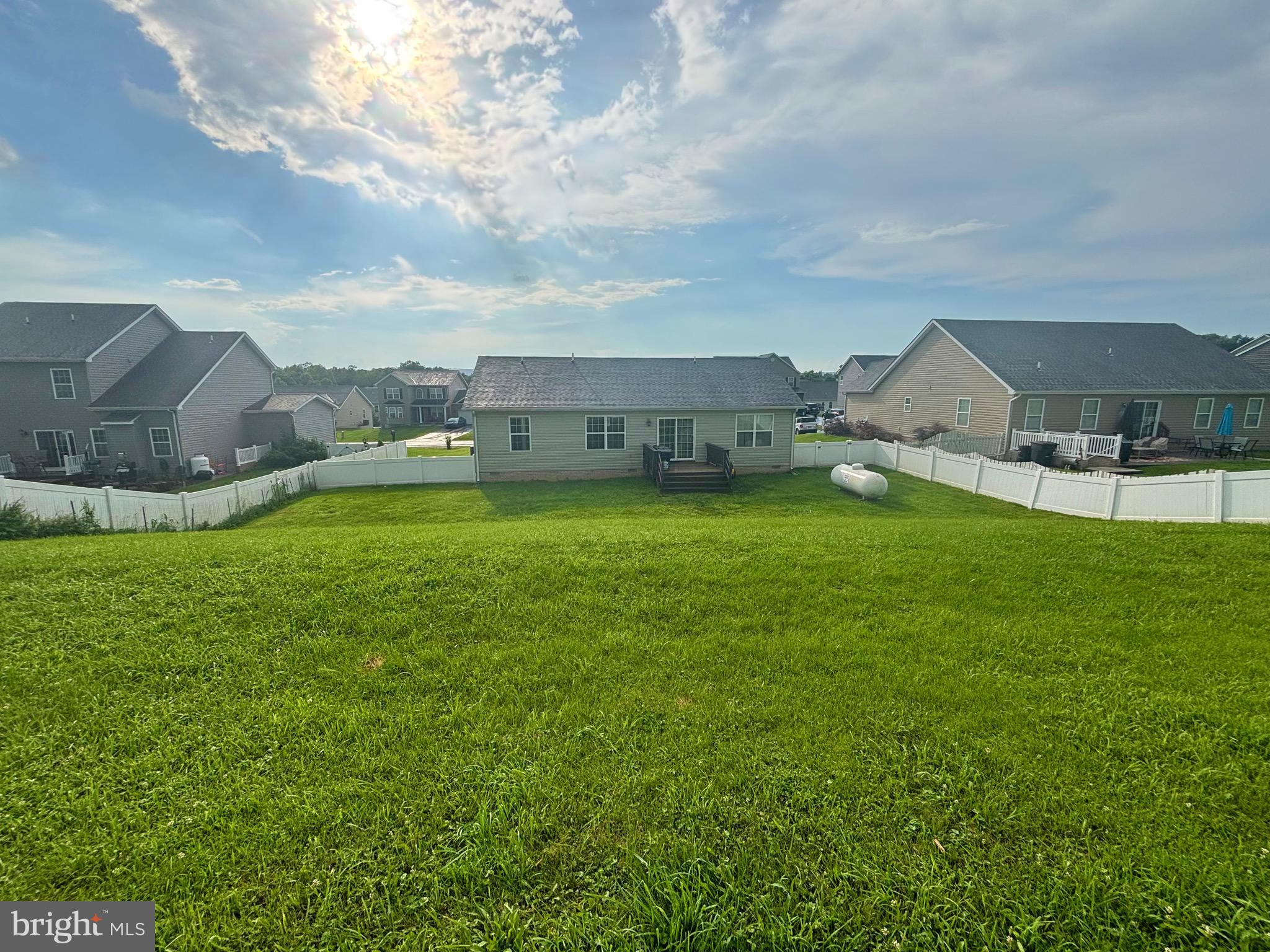 56 Reprisal Road Inwood, WV 25428 - Photo 29 of 31 a view of a garden with a house in the background