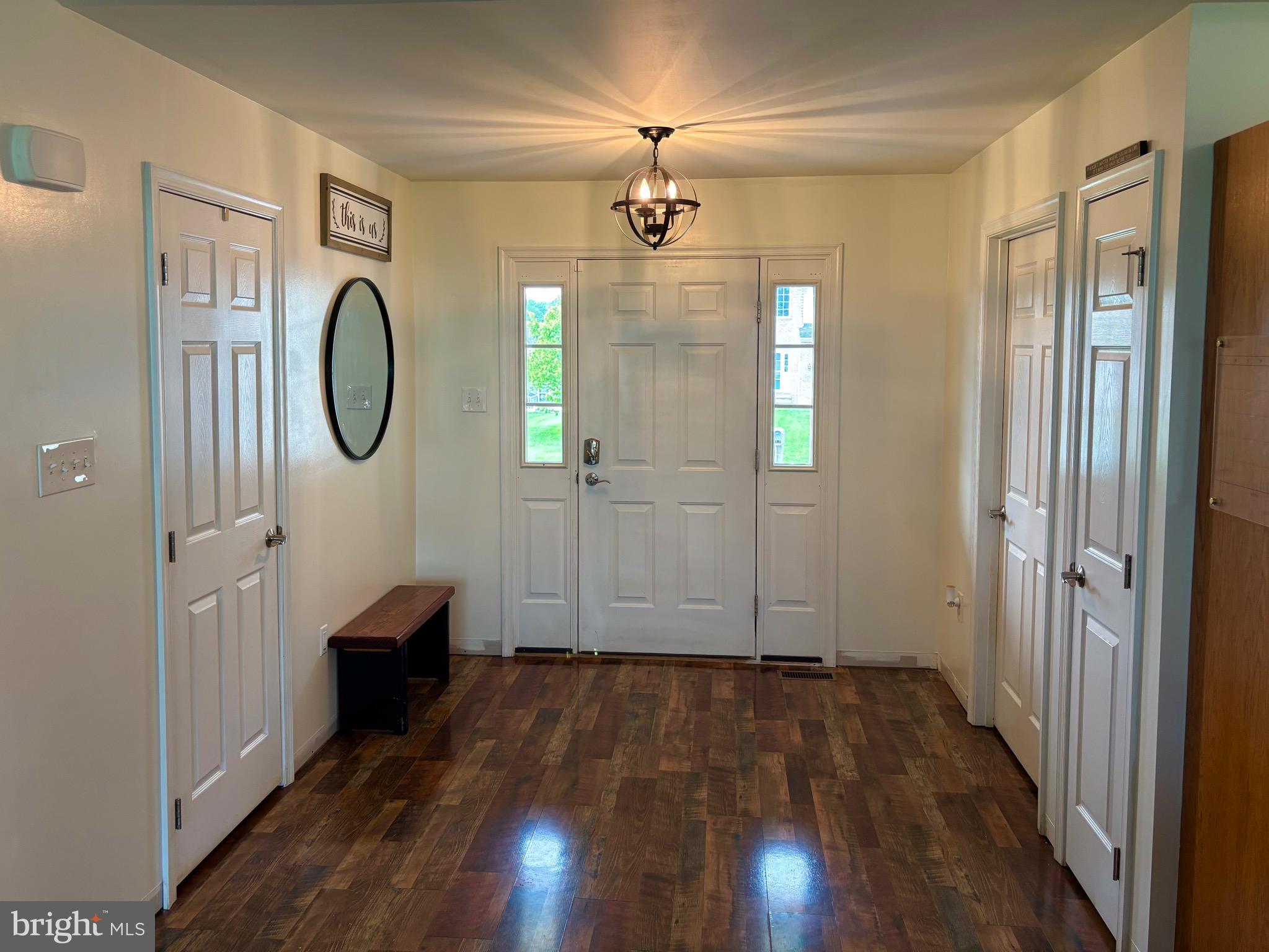 56 Reprisal Road Inwood, WV 25428 - Photo 4 of 31 a view of a livingroom with wooden floor and window
