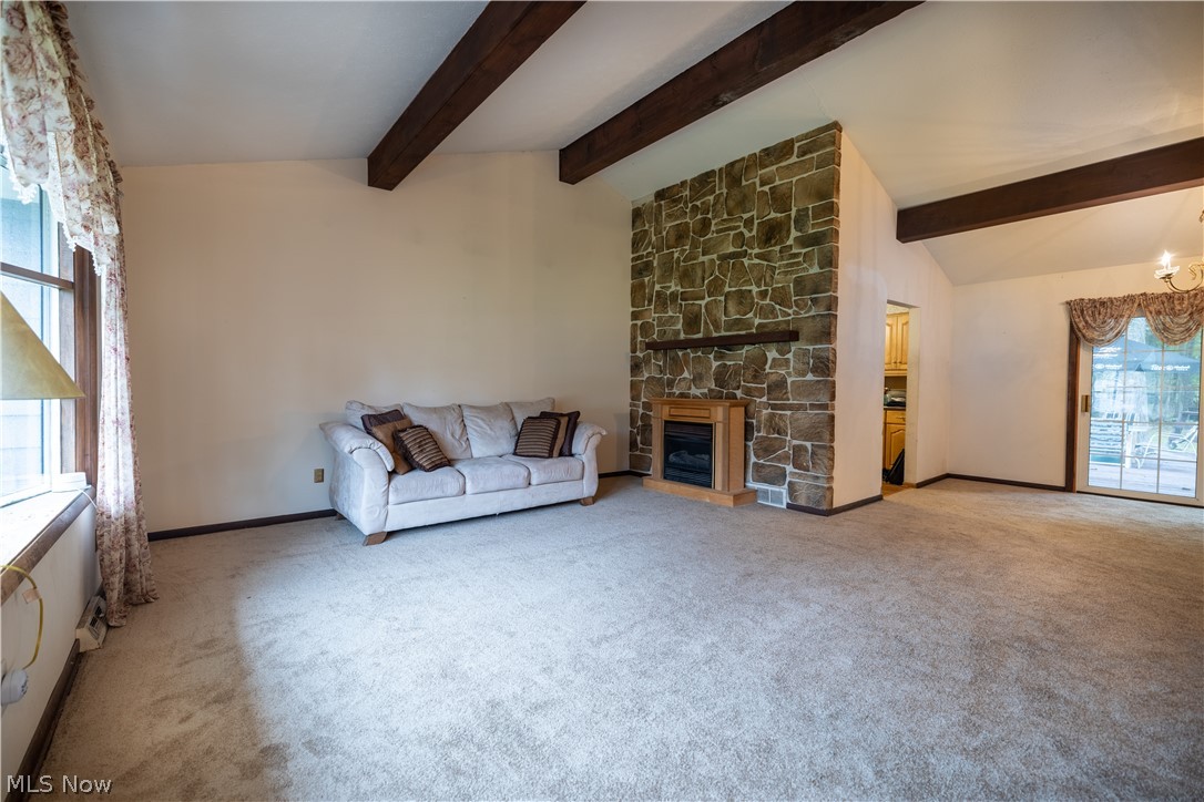 7961 Bellflower Road Mentor, OH 44060 - Photo 9 of 32 Living Room with vaulted ceilings and wood beams
