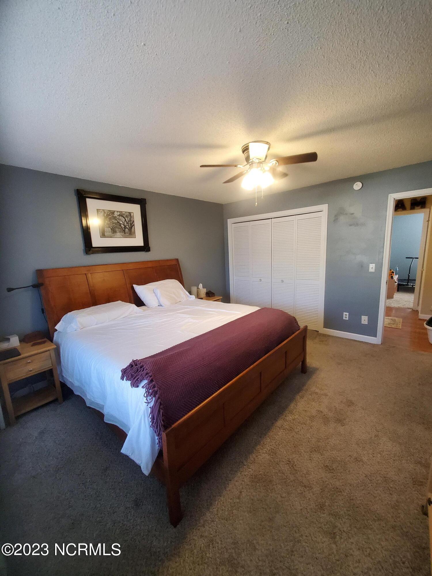 104 Valley Road Camden, NC 27921 - Photo 19 of 28 Owners suite bedroom with two closets. One walk-in & one standard.