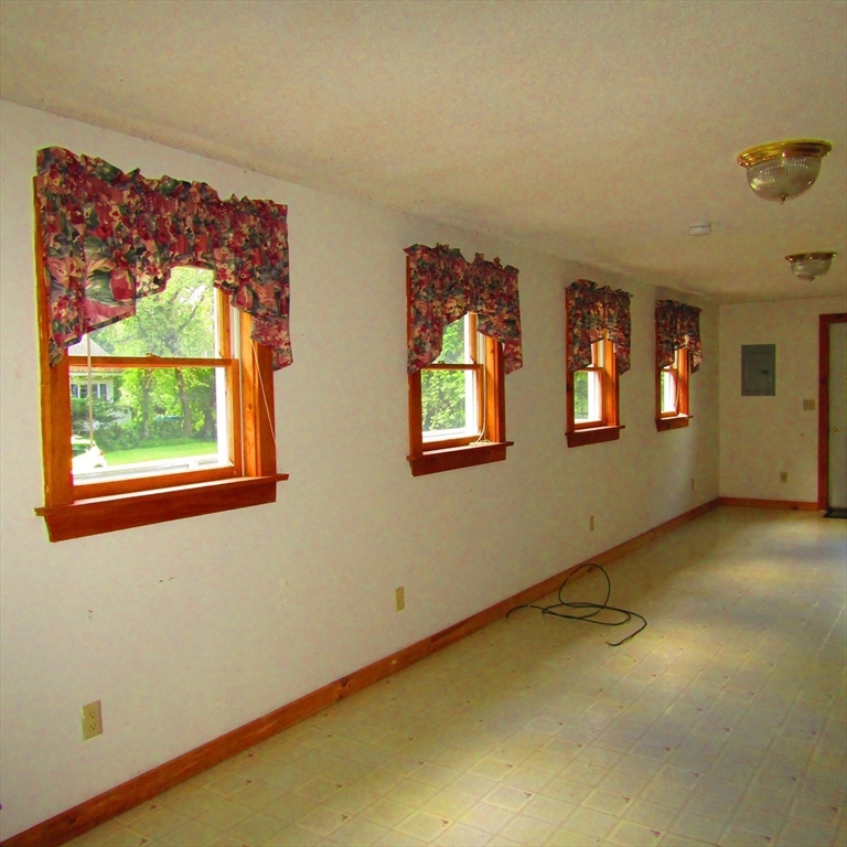 79 Aqua Vitae Road Hadley, MA 01035 - Photo 14 of 25 an empty room with windows