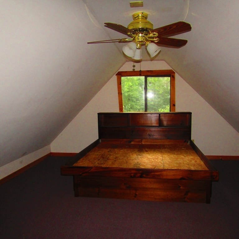 79 Aqua Vitae Road Hadley, MA 01035 - Photo 18 of 25 a room with a chandelier