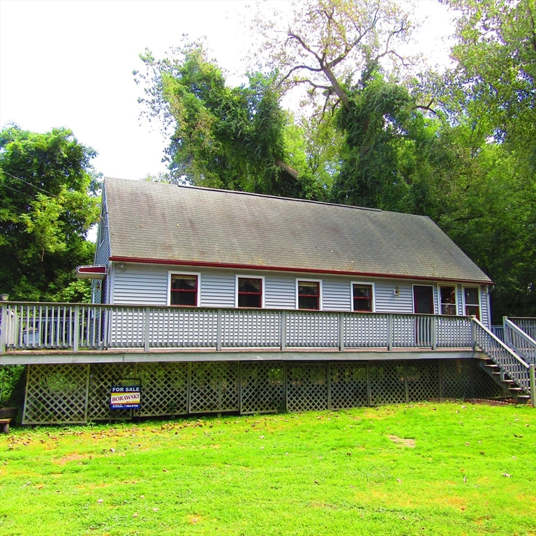 79 Aqua Vitae Road Hadley, MA 01035 - Photo 3 of 25 a view of a house with a swimming pool