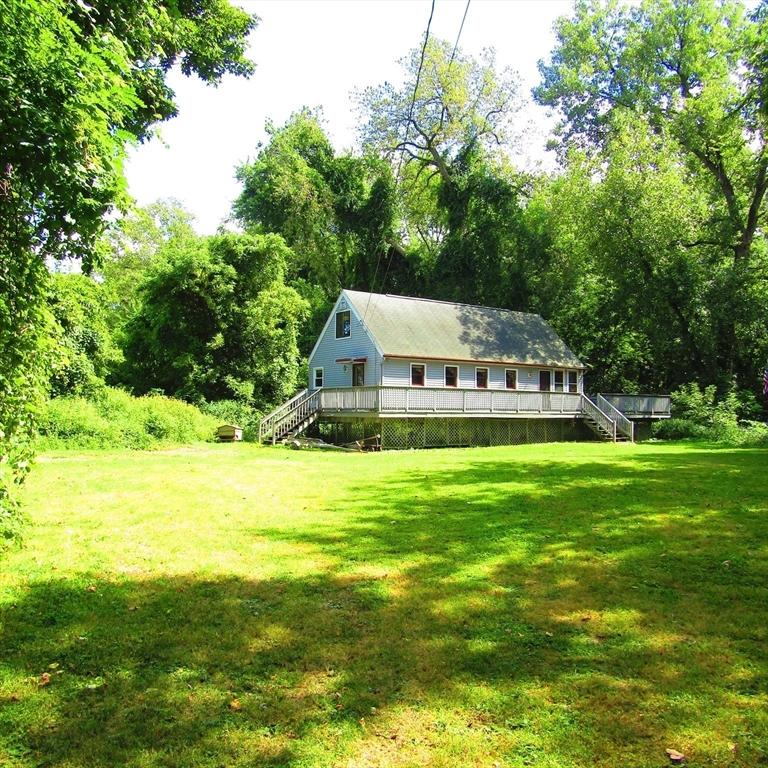 79 Aqua Vitae Road Hadley, MA 01035 - Photo 6 of 25 a view of a house with a big yard