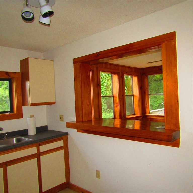 79 Aqua Vitae Road Hadley, MA 01035 - Photo 8 of 25 a hallway with a large window