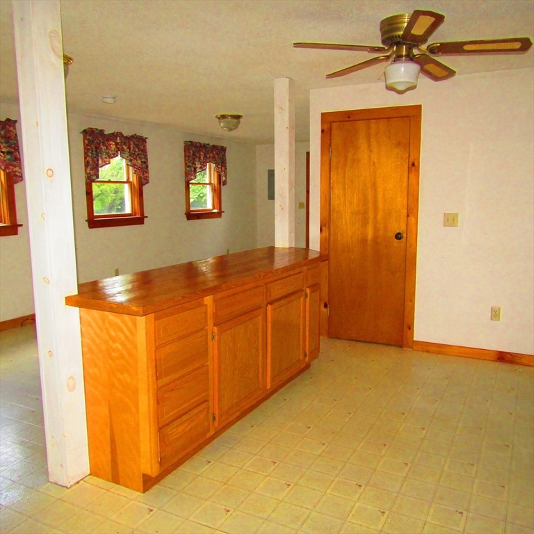 79 Aqua Vitae Road Hadley, MA 01035 - Photo 9 of 25 a view of a kitchen from the hallway