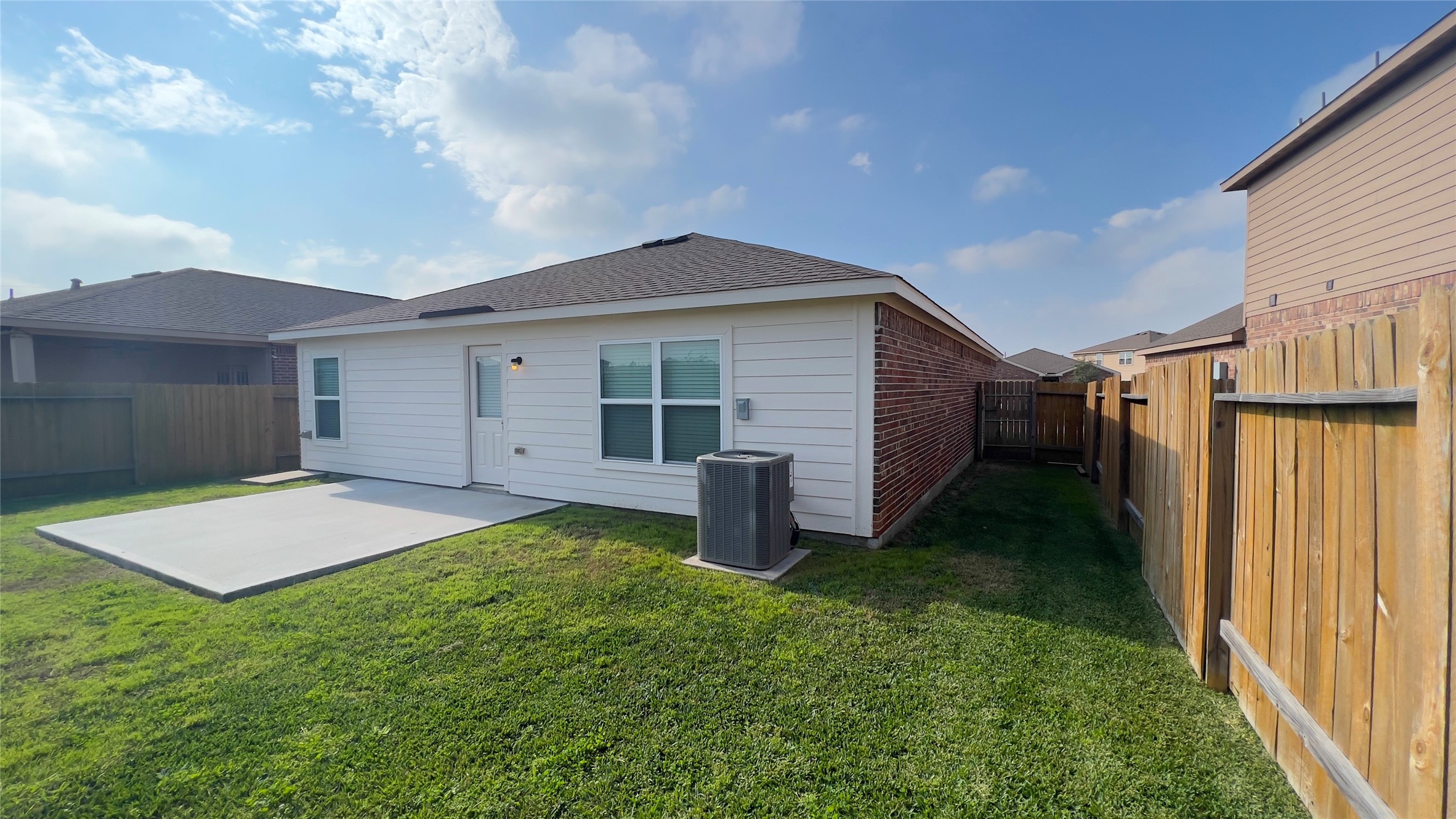 20714 Round Key Drive Hockley, TX 77447 - Photo 16 of 20 a house view with a backyard space