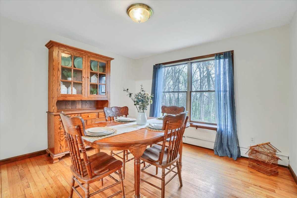 158 Bohl Road East Fishkill, NY 12533 - Photo 11 of 39 a view of a dining room with furniture and a window