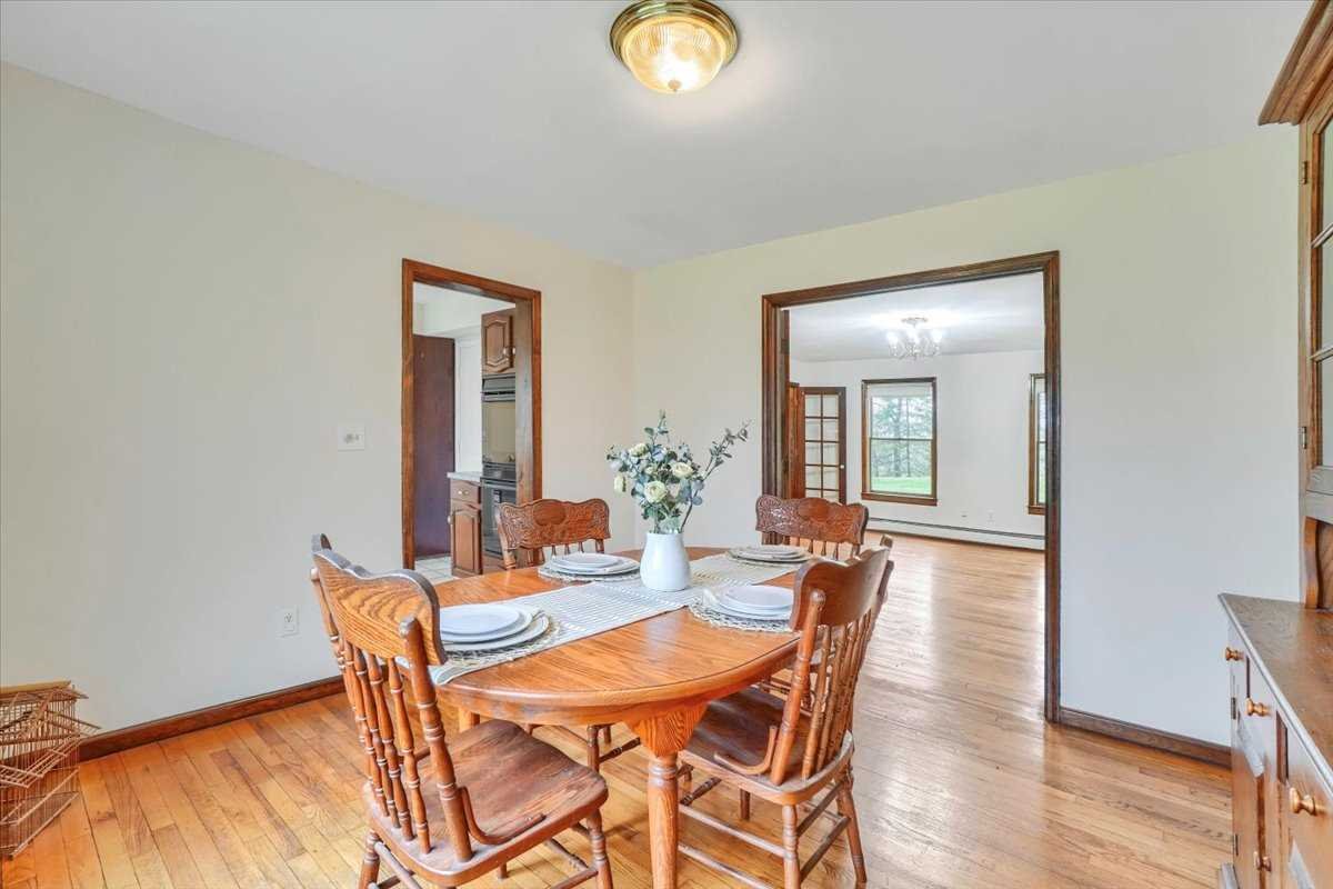 158 Bohl Road East Fishkill, NY 12533 - Photo 12 of 39 a dining room with furniture and wooden floor