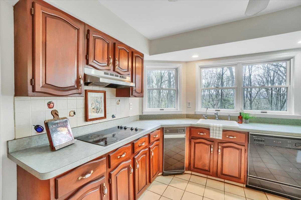 158 Bohl Road East Fishkill, NY 12533 - Photo 16 of 39 a kitchen with stainless steel appliances granite countertop a sink stove and cabinets