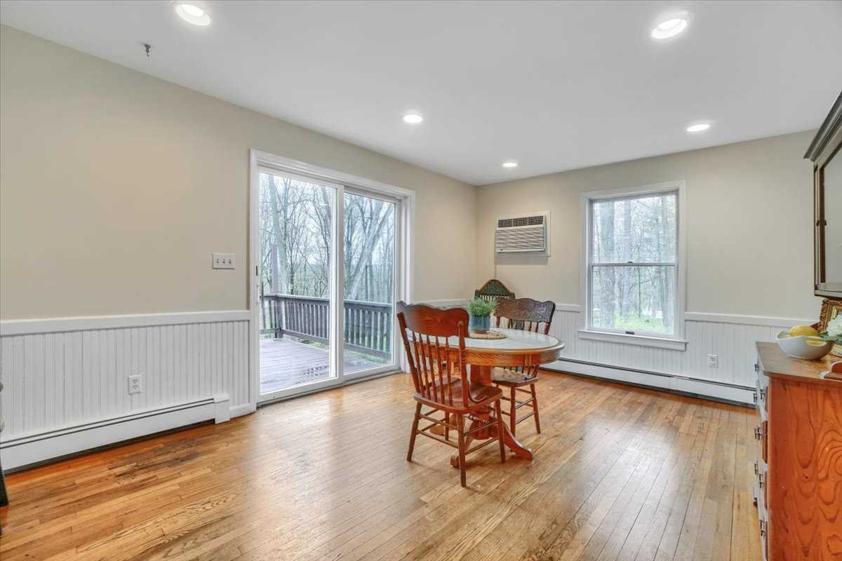 158 Bohl Road East Fishkill, NY 12533 - Photo 17 of 39 a view of a dining room with furniture window and wooden floor