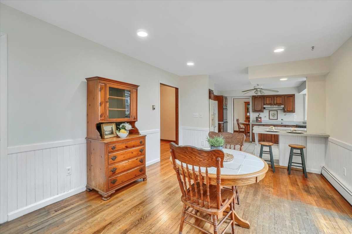 158 Bohl Road East Fishkill, NY 12533 - Photo 19 of 39 a dining room with furniture and wooden floor