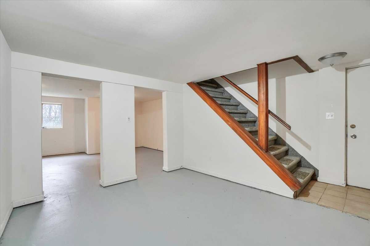 158 Bohl Road East Fishkill, NY 12533 - Photo 27 of 39 a view of an empty room with stairs and a ceiling fan