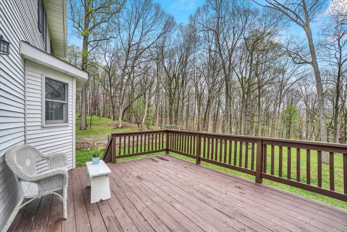 158 Bohl Road East Fishkill, NY 12533 - Photo 31 of 39 a view of a deck with a table and chairs