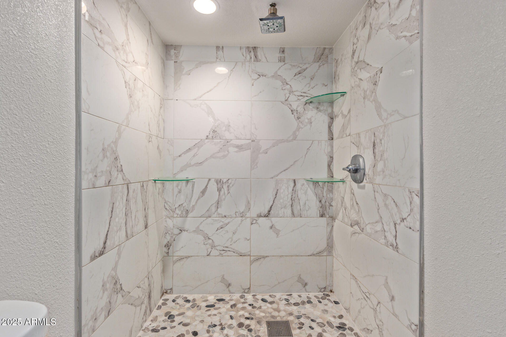 1221 North Dysart Road, Unit 35 Avondale, AZ 85323 - Photo 20 of 22 a bathroom with a shower