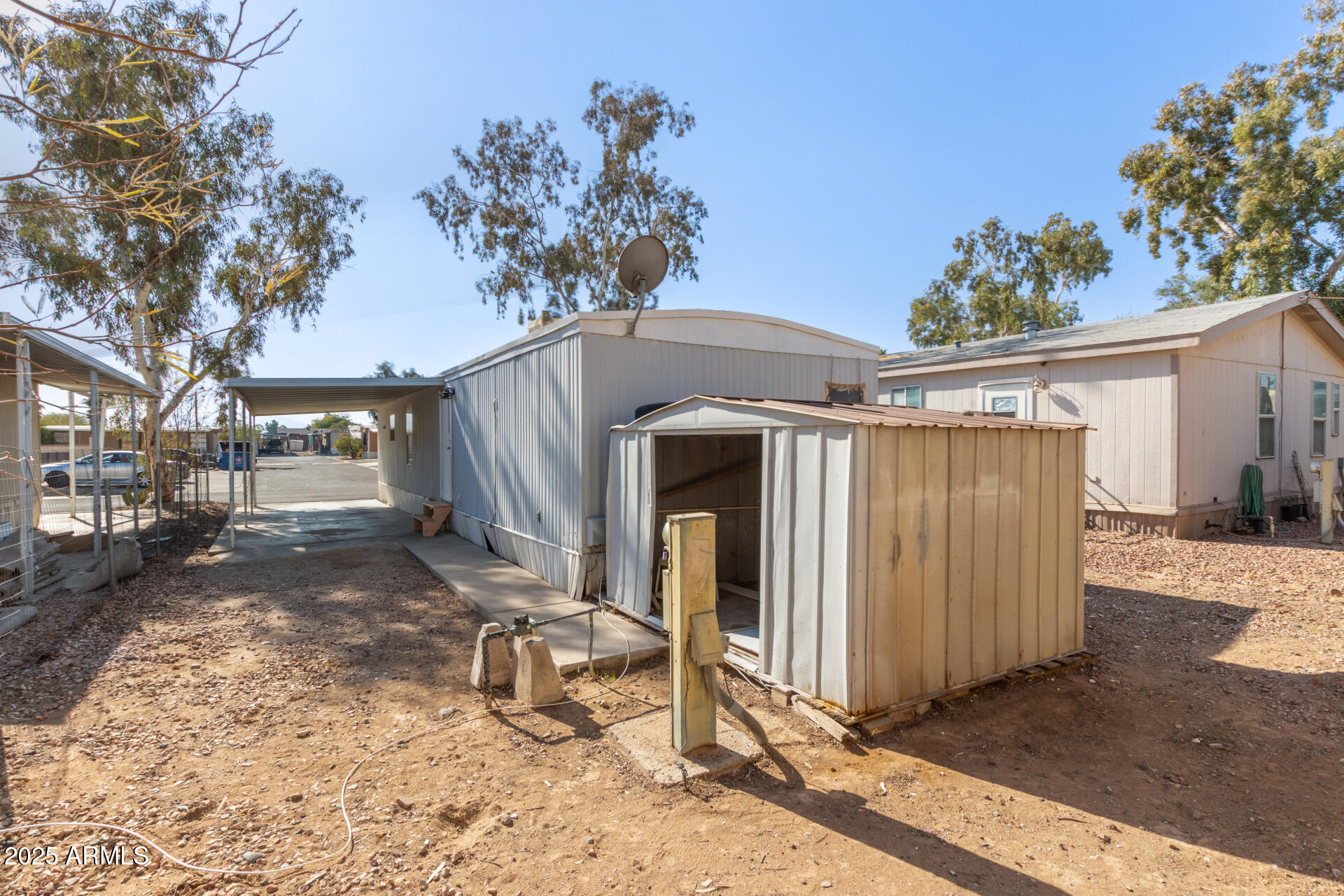1221 North Dysart Road, Unit 35 Avondale, AZ 85323 - Photo 22 of 22 a house view with a backyard space