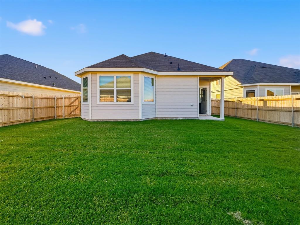 9944 Dynamic Drive Fort Worth, TX 76131 - Photo 16 of 17 a view of a house with a yard and sitting area