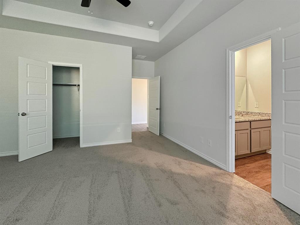 9944 Dynamic Drive Fort Worth, TX 76131 - Photo 10 of 17 an empty room with windows and closet