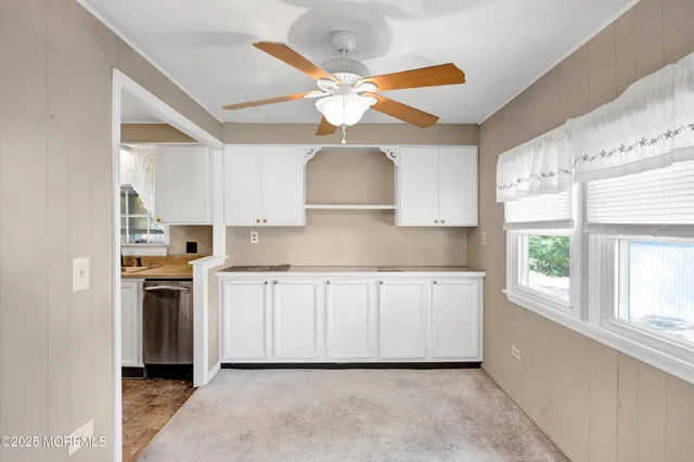 a house view with a seating space and garden