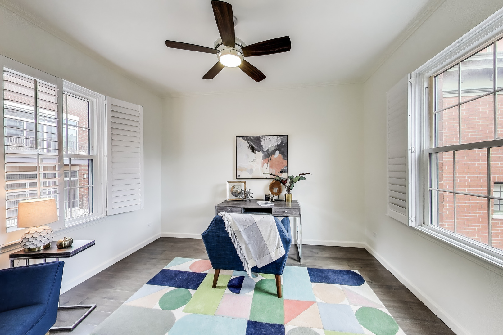 1034 West Monroe Street Chicago, IL 60607 - Photo 15 of 26 a view of a workspace with furniture and a window