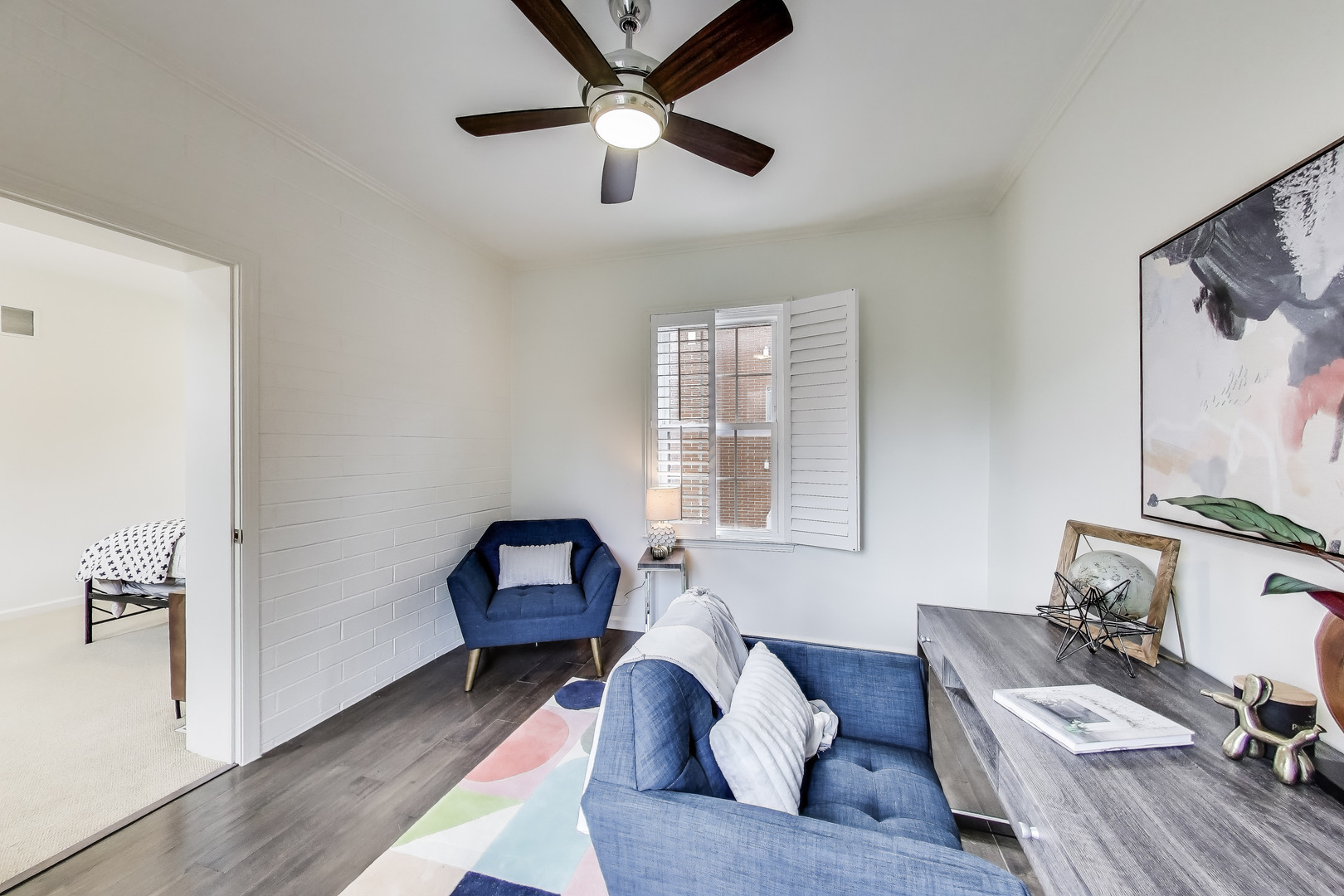 1034 West Monroe Street Chicago, IL 60607 - Photo 16 of 26 a living room with furniture and a wooden floor