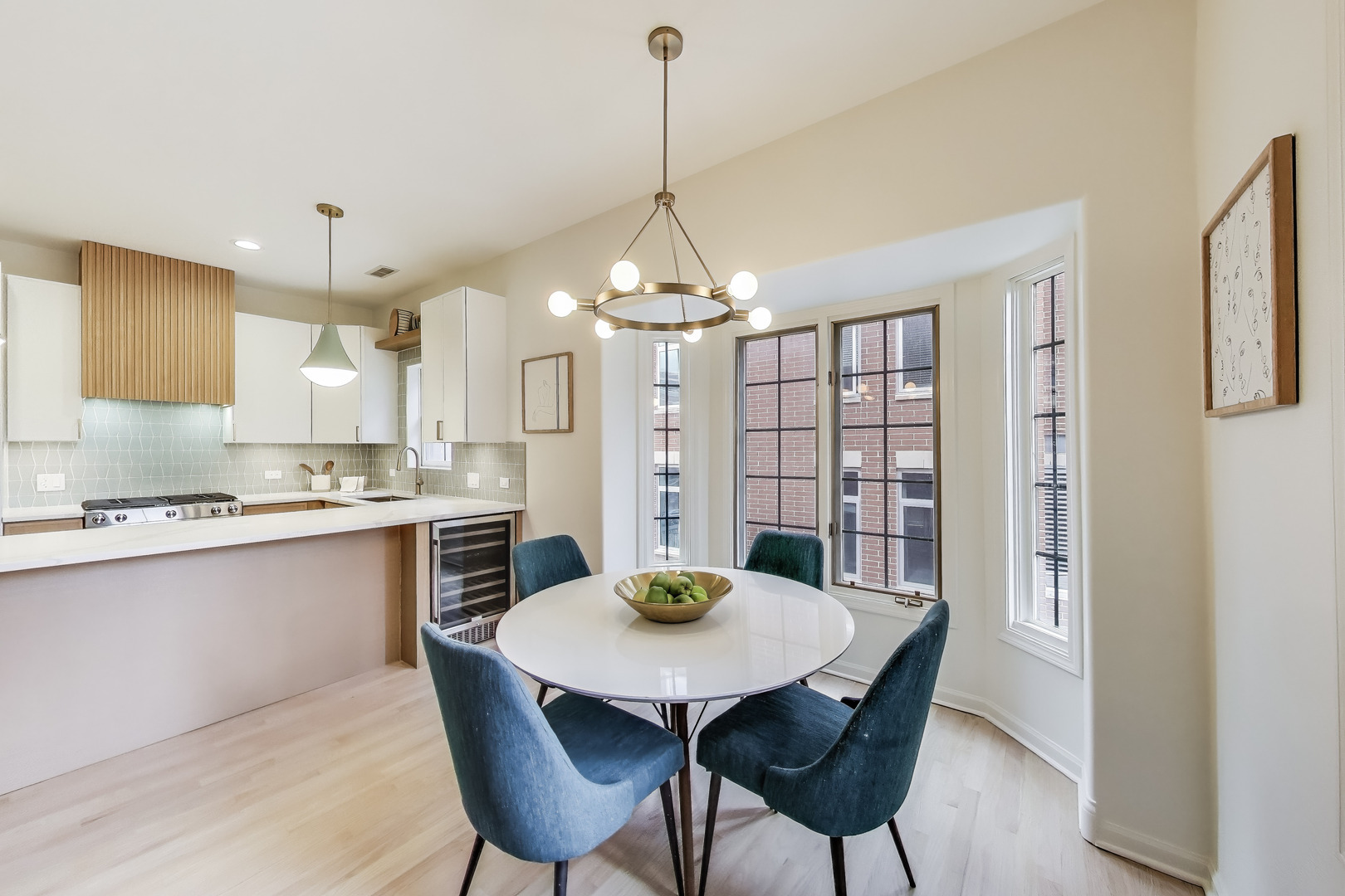 1034 West Monroe Street Chicago, IL 60607 - Photo 7 of 26 a kitchen with a table and chairs in it