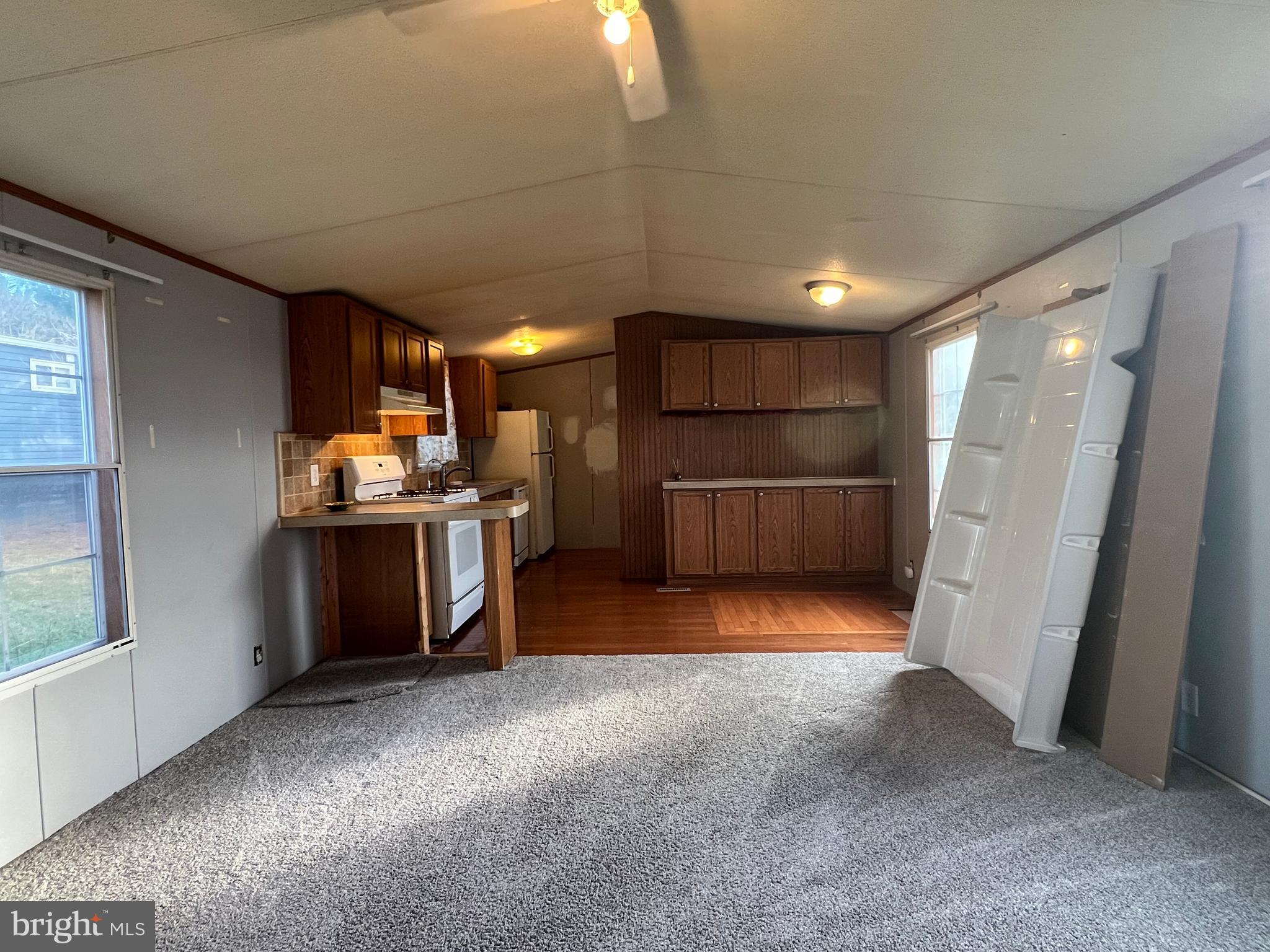 4328 Ridge Road, Unit 14 Mount Airy, MD 21771 - Photo 12 of 42 a view of kitchen with refrigerator and window